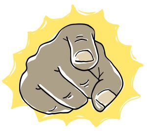 Un poing de face, et l’index pointé devant. Le poing est au centre d’une forme jaune énergique aux bords striés.